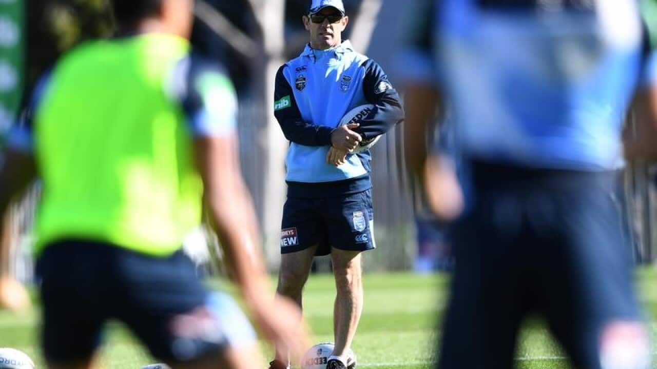 NSW Blues head coach Brad Fittler watches his players.