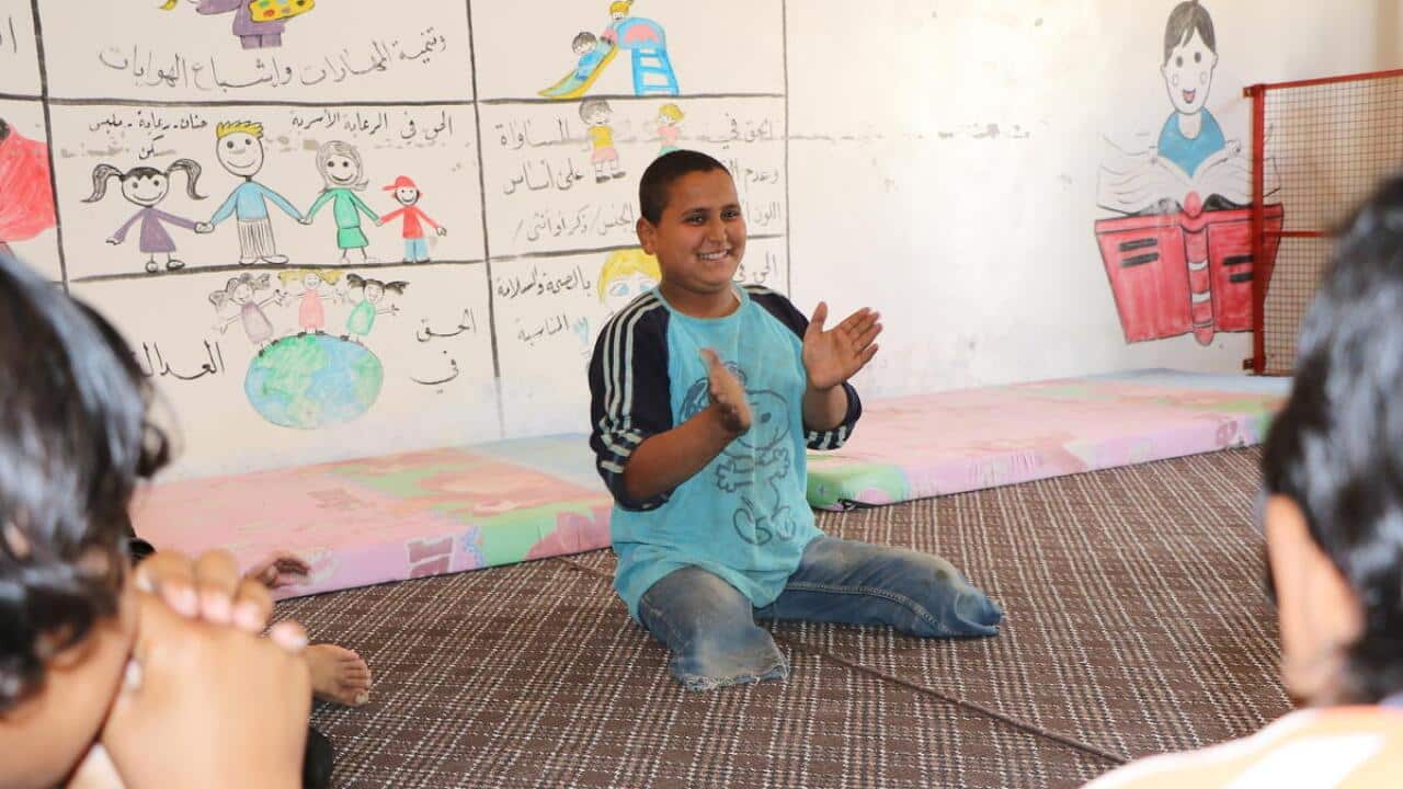 Mahmoud* at a child-friendly space run by Save the Children in  Al-Hol.