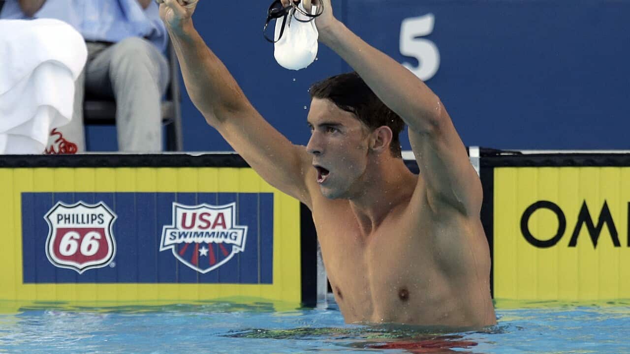 Michael Phelps celebrates his win in the finals of the 200-meter butterfly at the U.S. swimming nationals Friday, Aug. 7, 2015, in San Antonio. (AP Photo/Eric Gay)