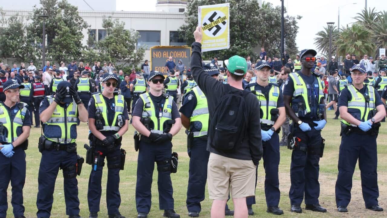 Police separated far-right groups from anti-racism demonstrators at St Kilda beach.