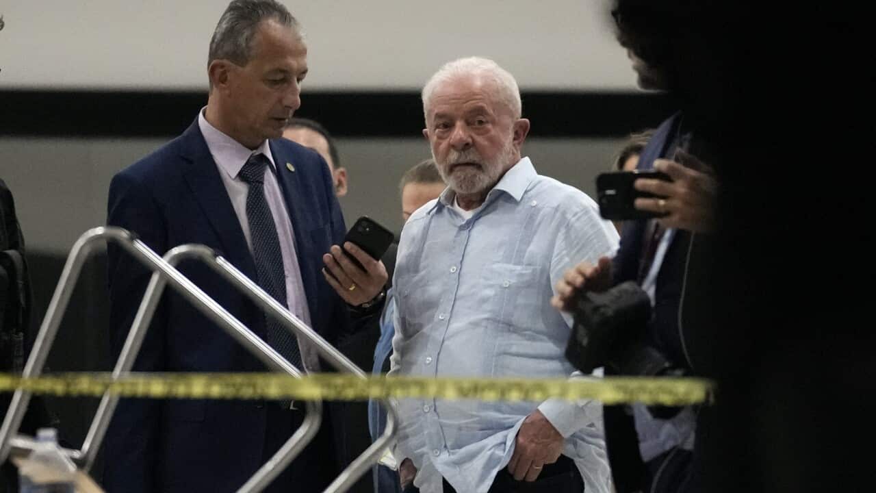 Brazil's President surveys damage at Planalto Palace after the protest (AAP).jpg