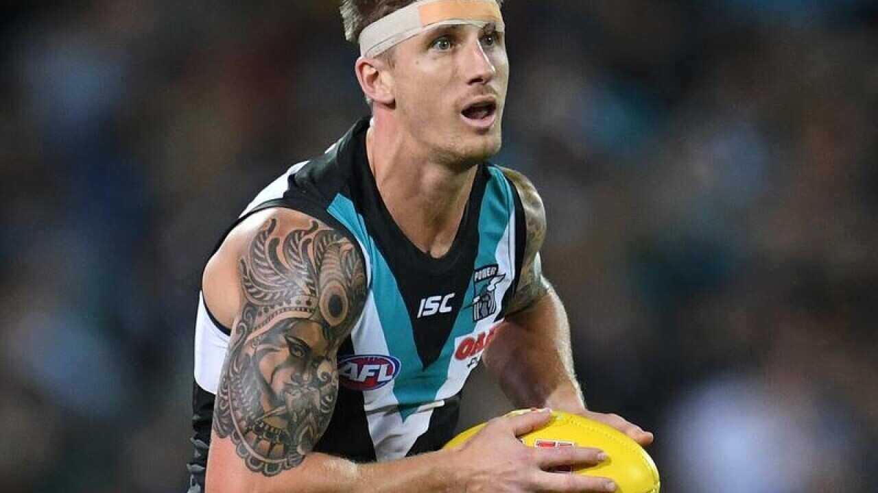 Hamish Hartlett of the Power in action during a game.