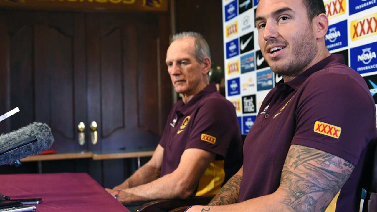 NRL player Darius Boyd (R) and Broncos coach Wayne Bennett