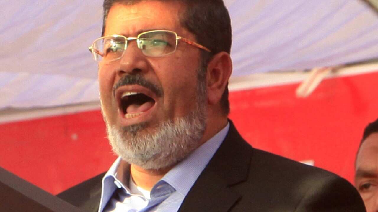 Morsi's party calls for mass rallies