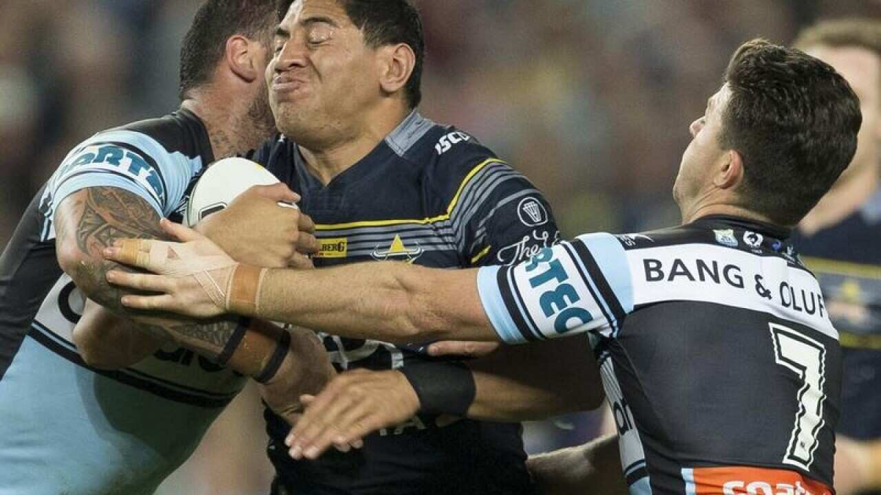 Jason Taumalolo is tackled
