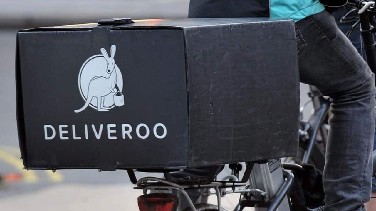 A Deliveroo cycle rider