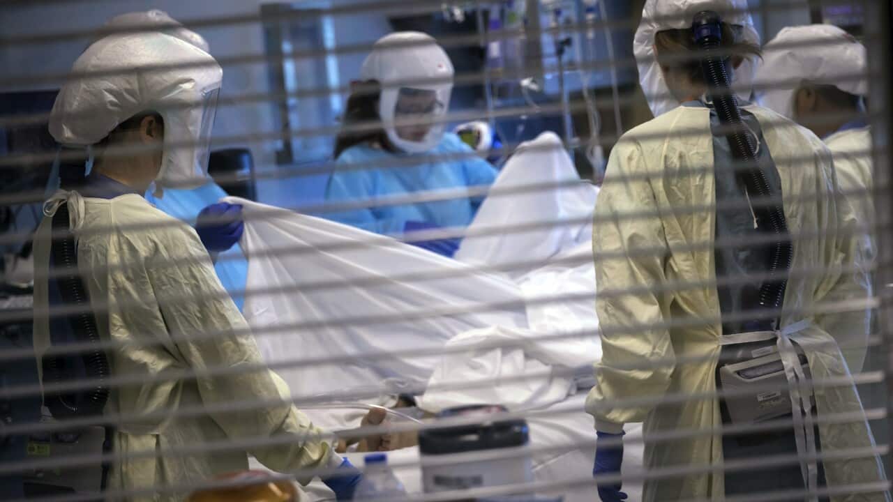 Medical professionals look after a COVID-19 patient in the intensive care unit on July 30, 2021, in Salt Lake City. 