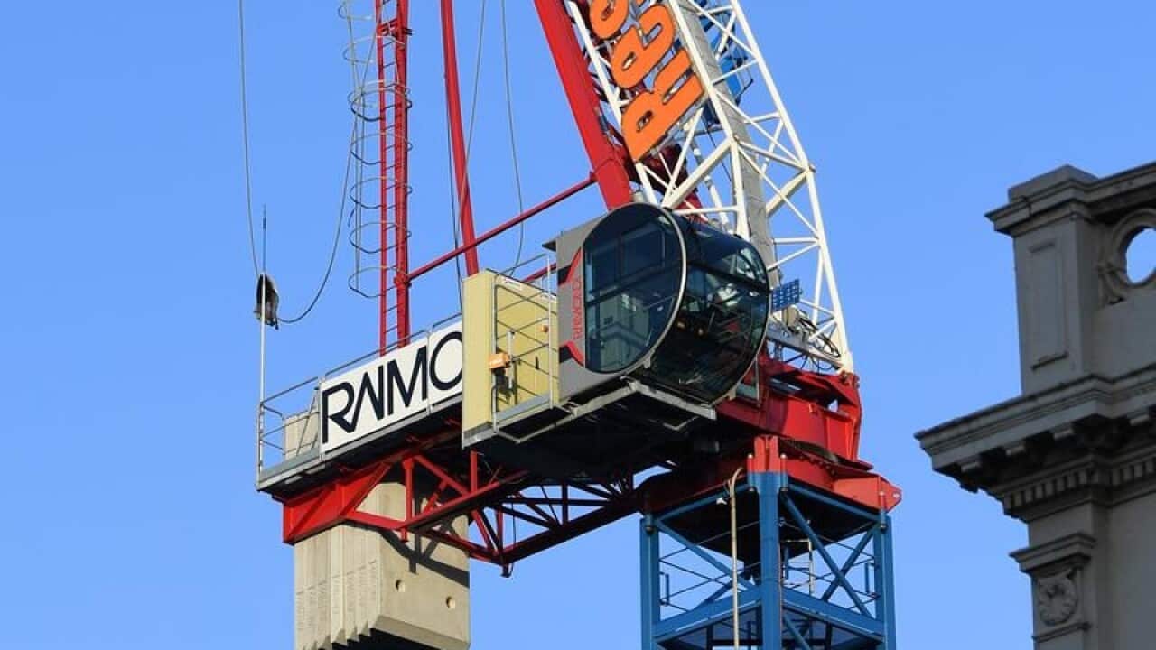 A damaged crane is seen in Richmond