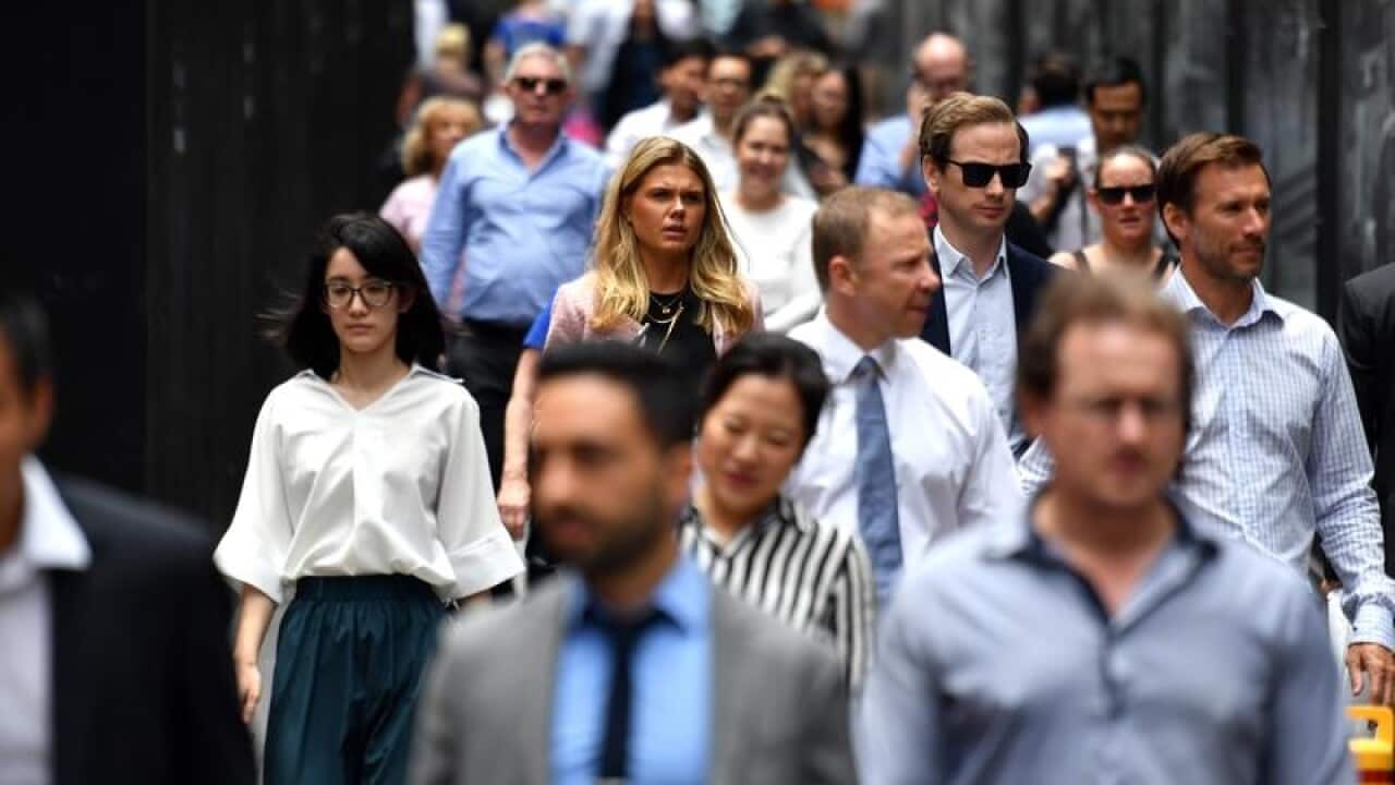 Office workers are seen at lunch break at Martin Place in Sydney