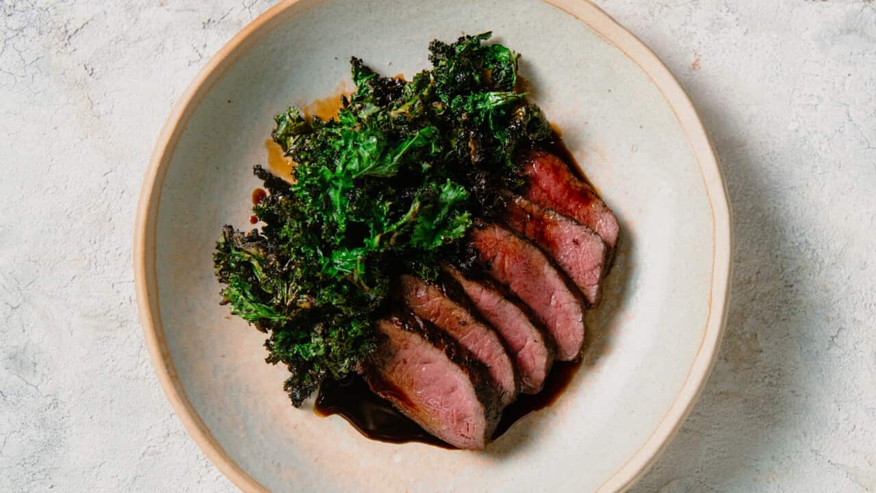 Venison backstrap with charred kale