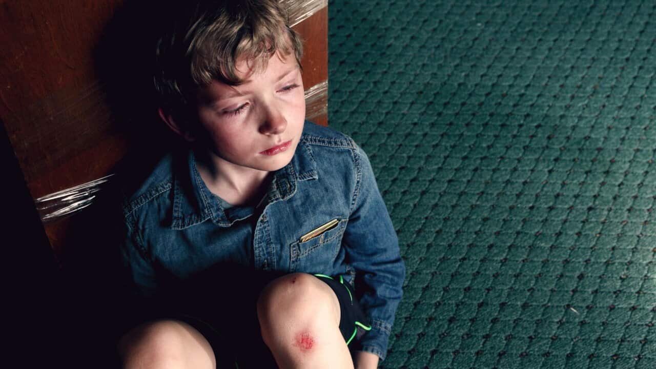 High Angle View Of Crying Boy