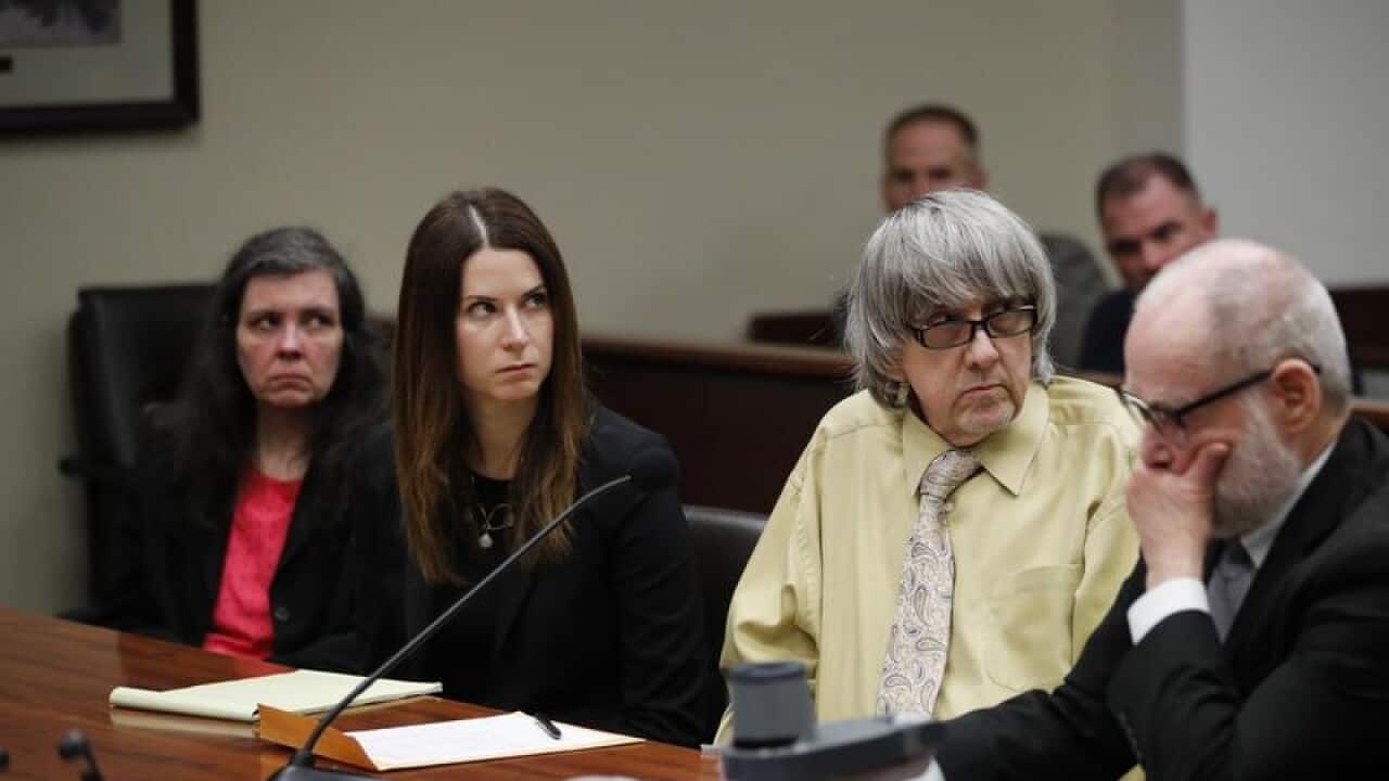 Louise Turpin (far L) and husband David with lawyers