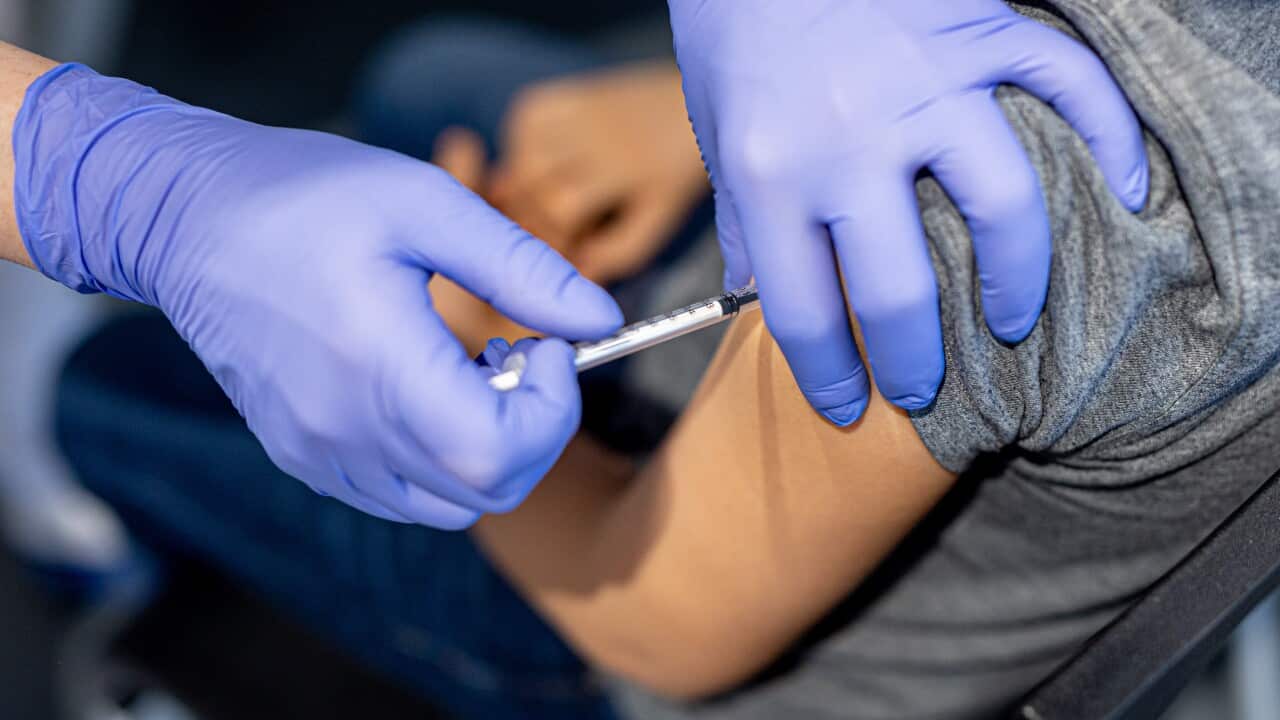 A child being vaccinated.