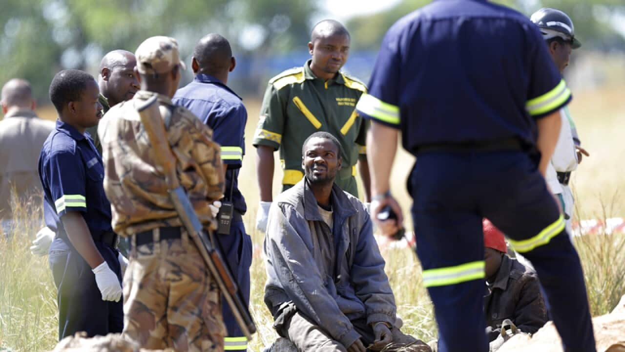 One of the rescued illegal miners (C) after being rescued from a mine