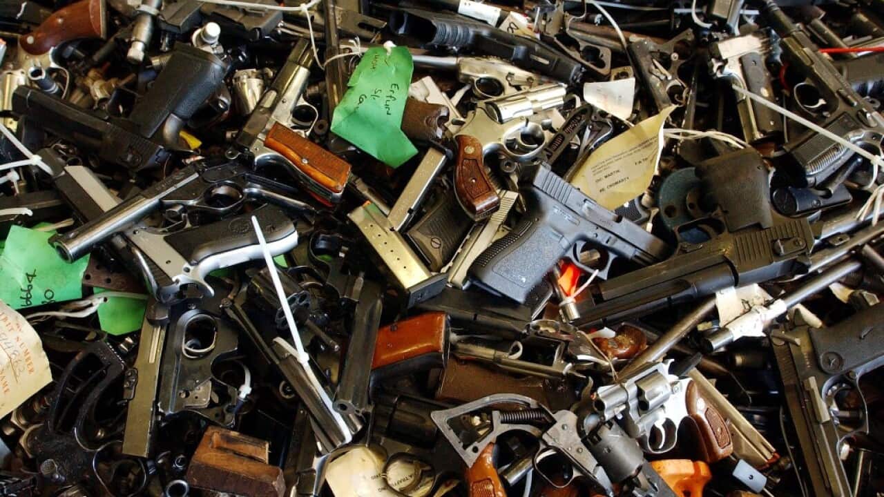 Sydney, July 20, 2004. Part of the final cache of more than 30, 000 firearms in Sydney today, seized under the NSW Firearms Amnesty and Handgun Buyback to be destroyed this week. (AAP Image/Mick Tsikas) NO ARCHIVING