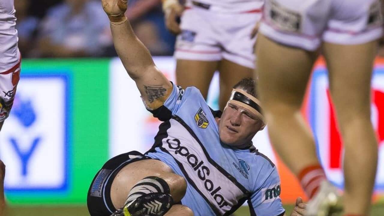 Paul Gallen of the Sharks calls for help.