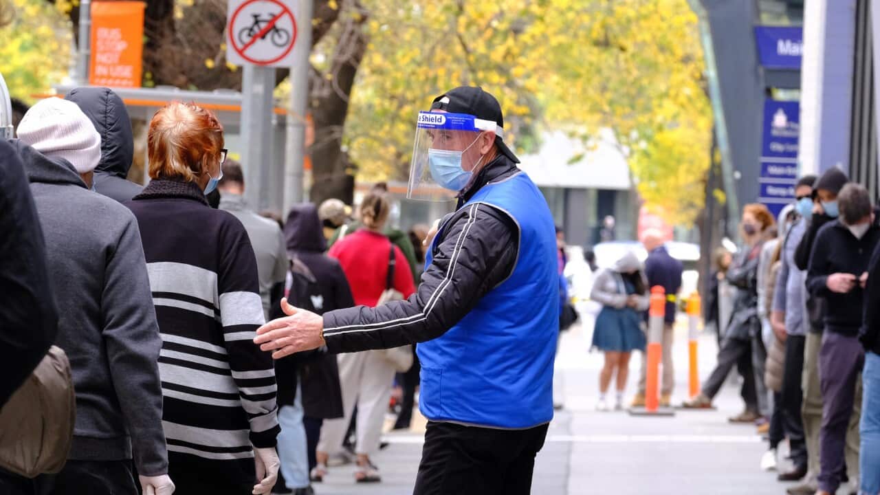 People line up to get tested for Covid-19 outside the Royal Melbourne Hospital in Melbourne