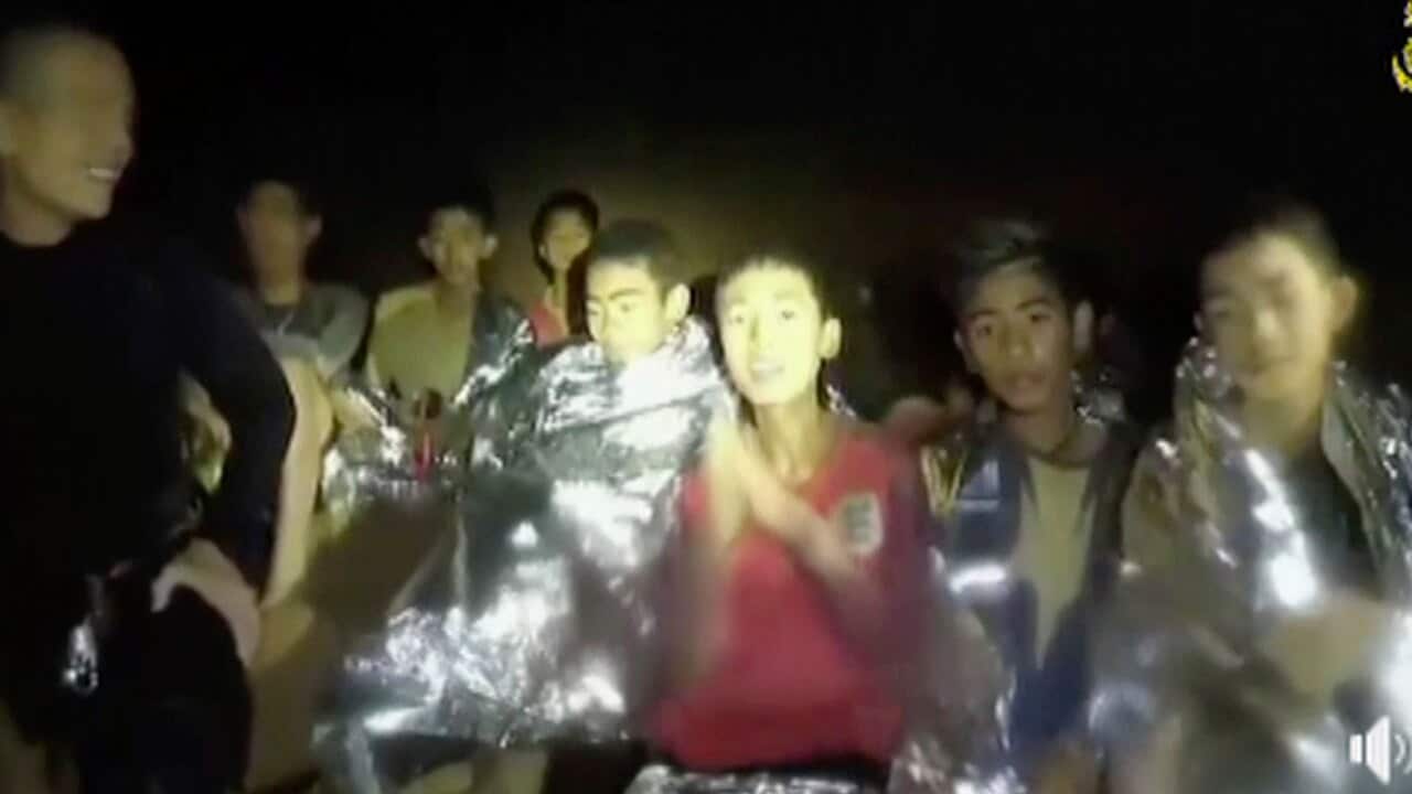 The Thai boys were pictured with Navy Seals inside the cave in northern Thailand. 