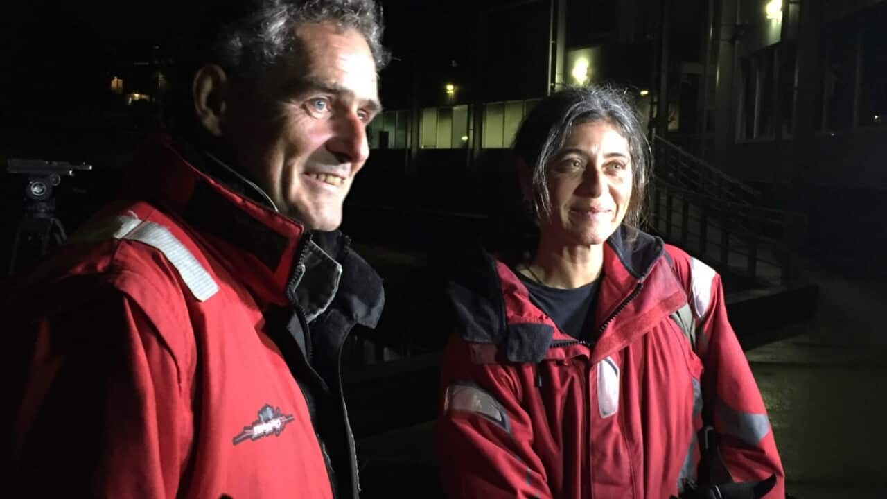 Nick Dwyer and Barbara Heftman arrived safely in Sydney after their yacht's rudder broke in treacherous conditions and they were rescued by NSW Police.