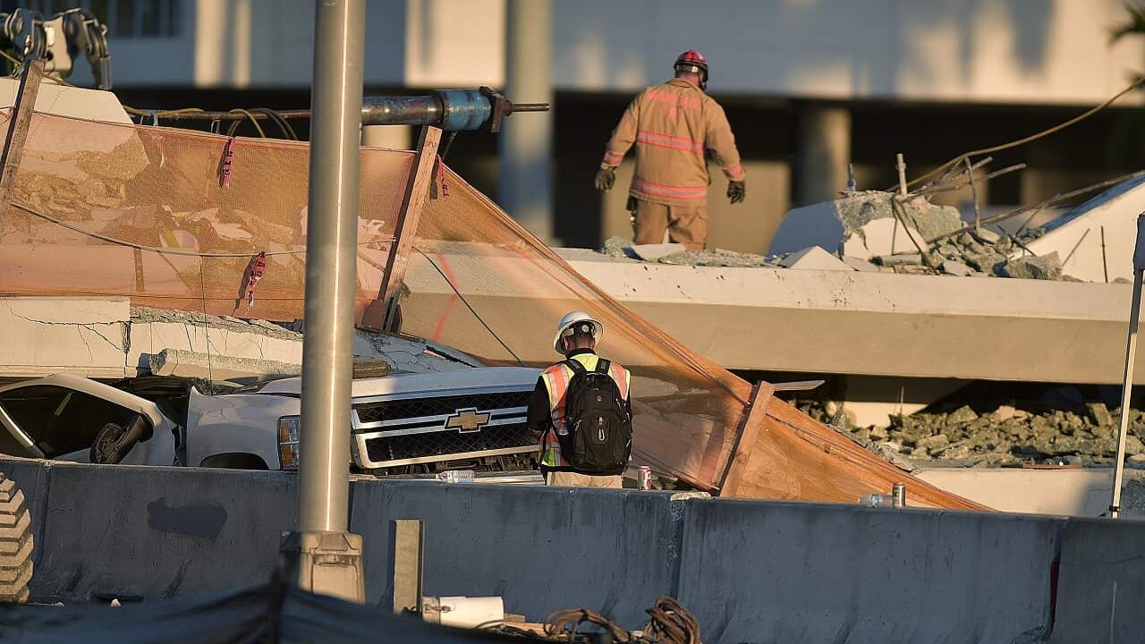 Four prople have been confirmed dead after a 950-ton pedestrian bridge collapsed in front of Florida International University.