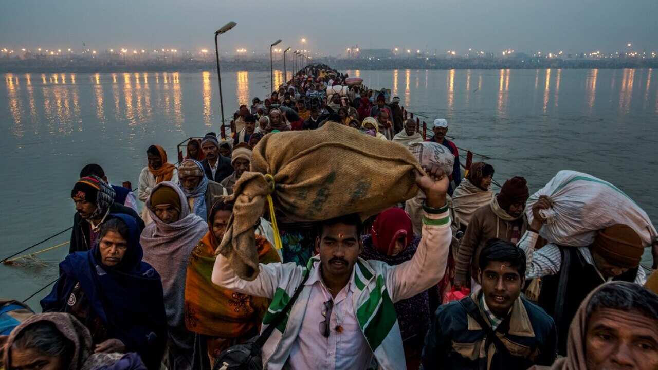 People come from all over the world for the Kumbh Mela river pilgrimage, which is this year expected to bring around 100 million people to Allahabad over 55 days. (Getty)
