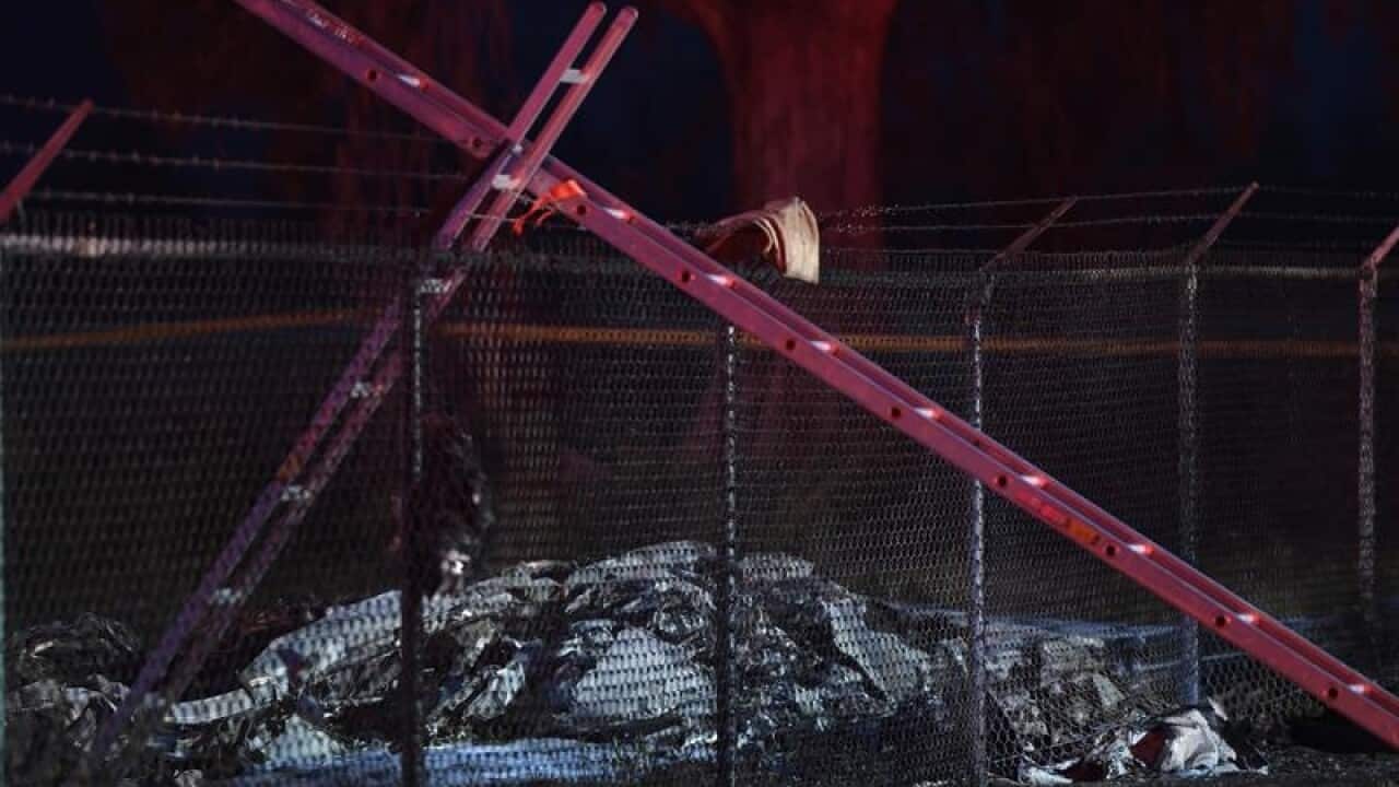 The wreckage of a small plane that crashed in Hawaii, killing 11