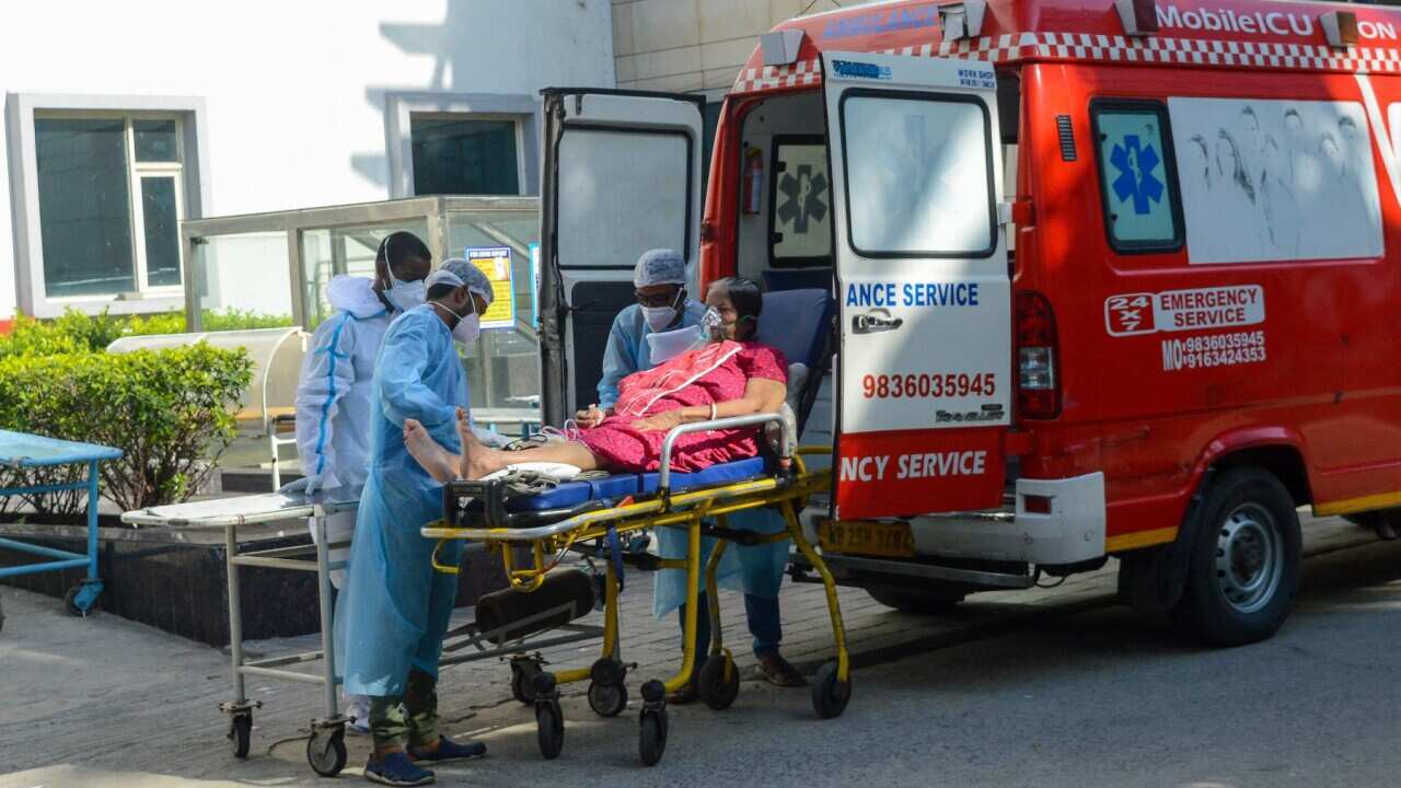 A patient who tested positive for COVID-19 is been taken to a critical care unit at a hospital in Kolkata , India , on 20 May 2021 . Photo by Debarchan Chatterjee/ABACAPRESS.COM.