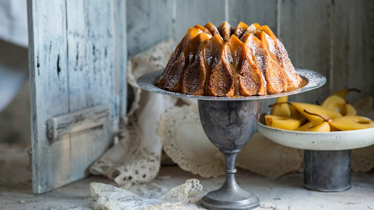 Brown-sugar ripple buttermilk Bundt cake with wine-roasted pears and caramel sauce