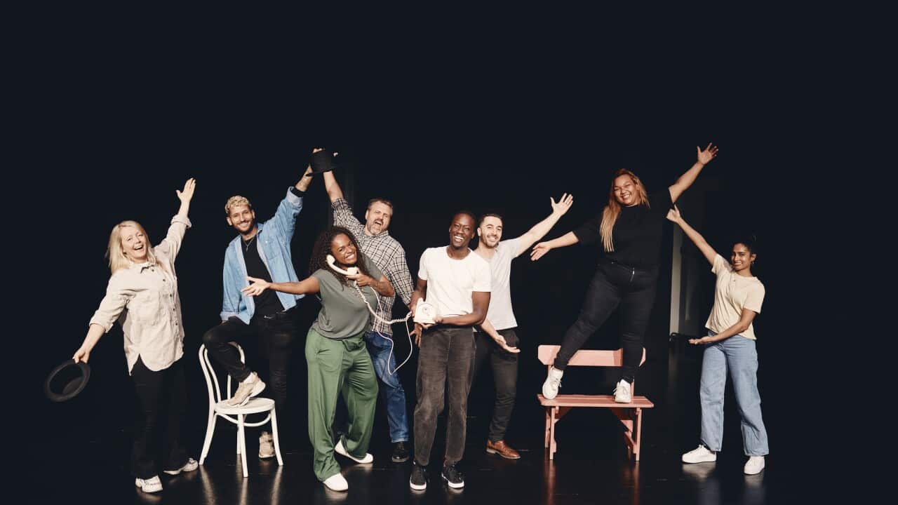 Full length portrait of happy artists together on stage