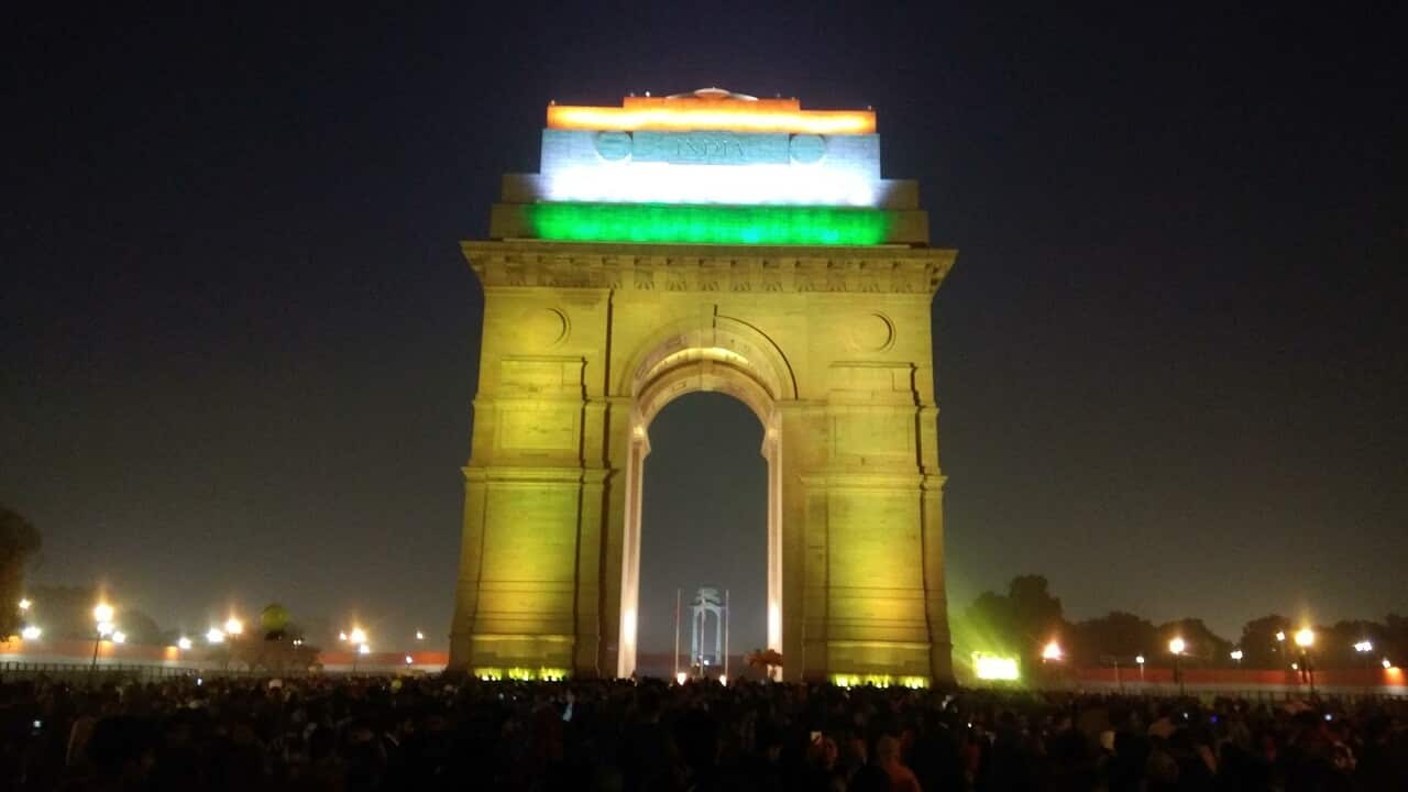 India Gate is lit up in the colors of the Indian flag on India's 69th Republic Day in New Delhi on January 26, 2018.