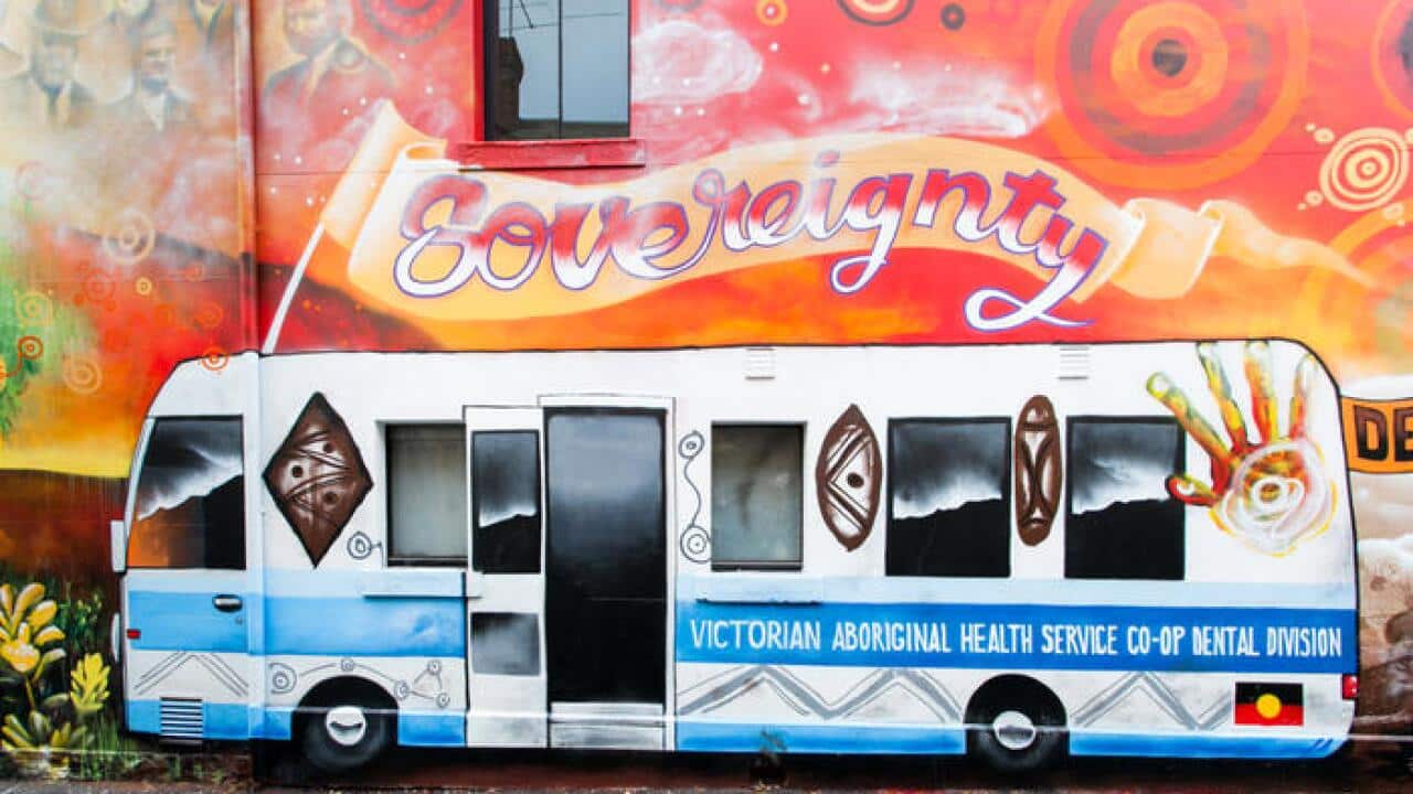 Charcoal Lane mural in Melbourne’s Gertrude Street, Fitzroy by Gunnai Waradgerie artist Robert Young.