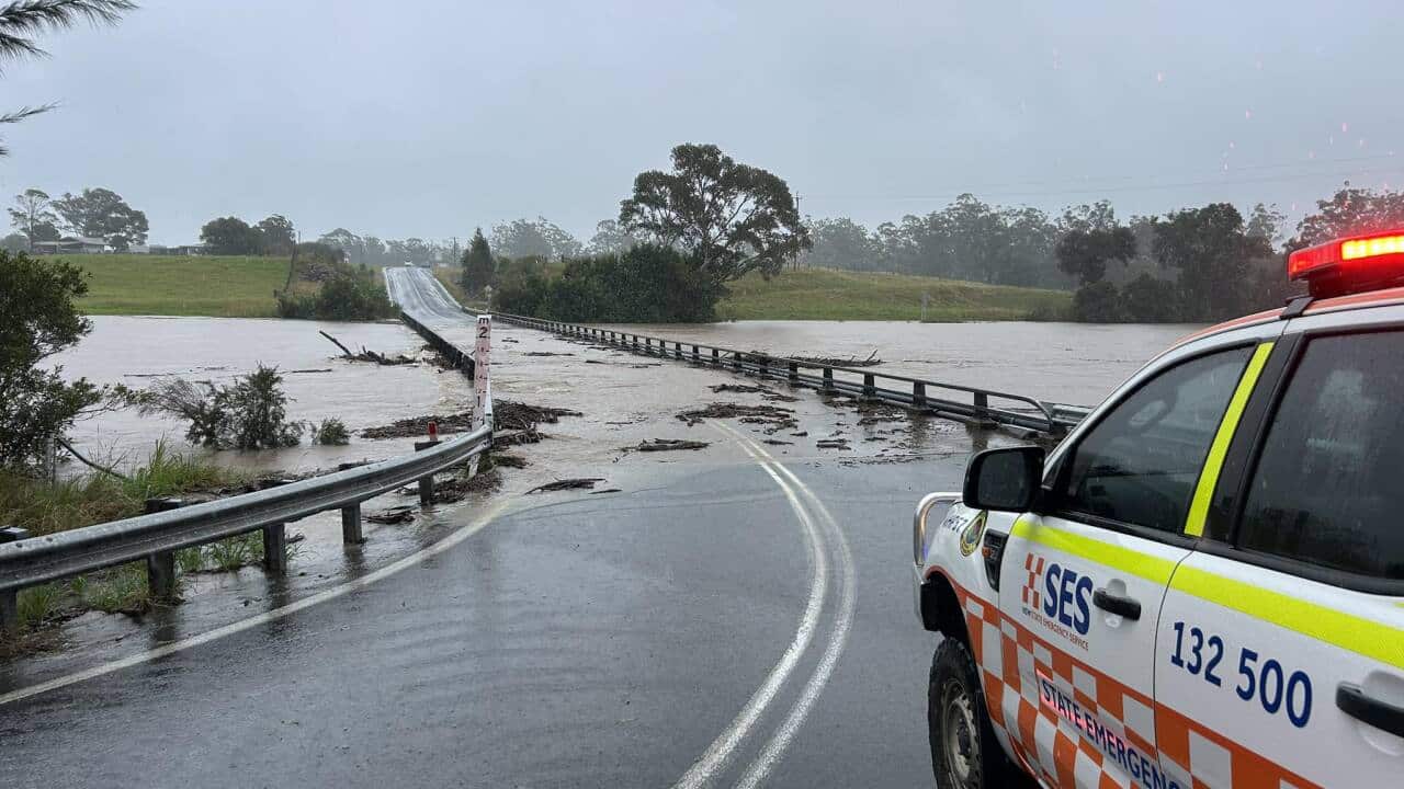 An SES vehicle on a flooded road.