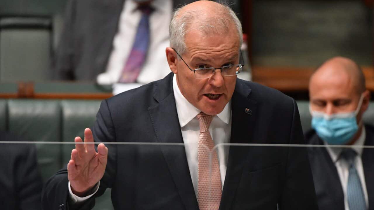 Prime Minister Scott Morrison during Question Time in the House of Representatives at Parliament House in Canberra, Wednesday, February 9, 2022. (AAP Image/Mick Tsikas) NO ARCHIVING
