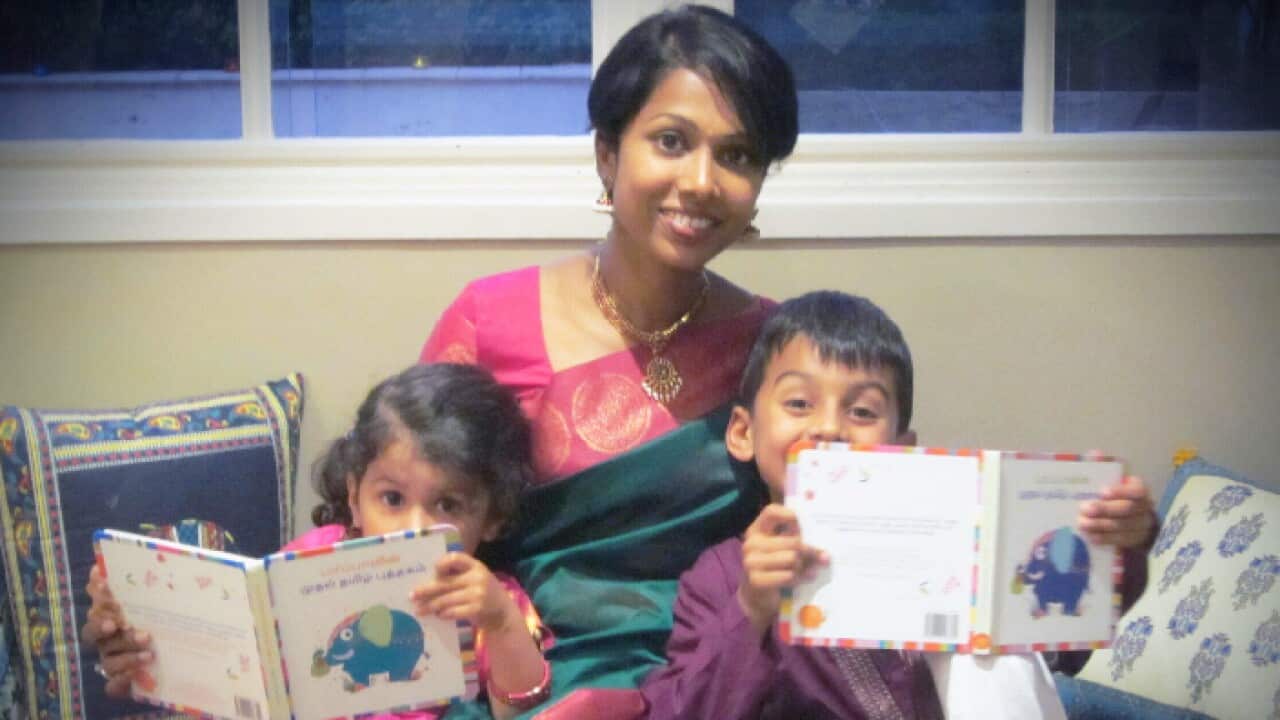 Vanitha Veerasamy with her books & young readers