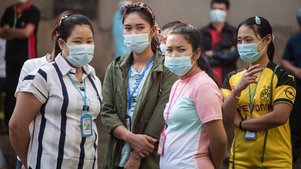 Migrant workers waiting Covid-19 test at Bangkok Fish Organization during a Covid-19 outbreak in Thailand (Adisorn Chabsungnoen - SOPA Images - LightRocket via Getty Images)
