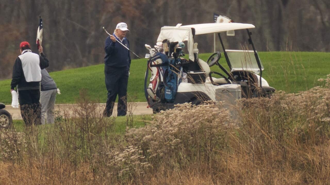 President Donald Trump plays golf at Trump National Golf Club in Sterling, Va.