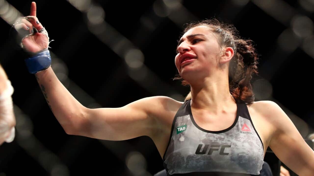 Nadia Kassem celebrates her victory over Alex Chambers of Australia in their women's strawweight bout during the UFC Fight Night in Nov 2017.