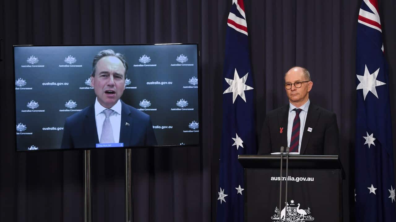 Australian Health Minister Greg Hunt speaks via video link to the media during a press conference at Parliament House in Canberra, Friday, December 24, 2021. (AAP Image/Lukas Coch) NO ARCHIVING
