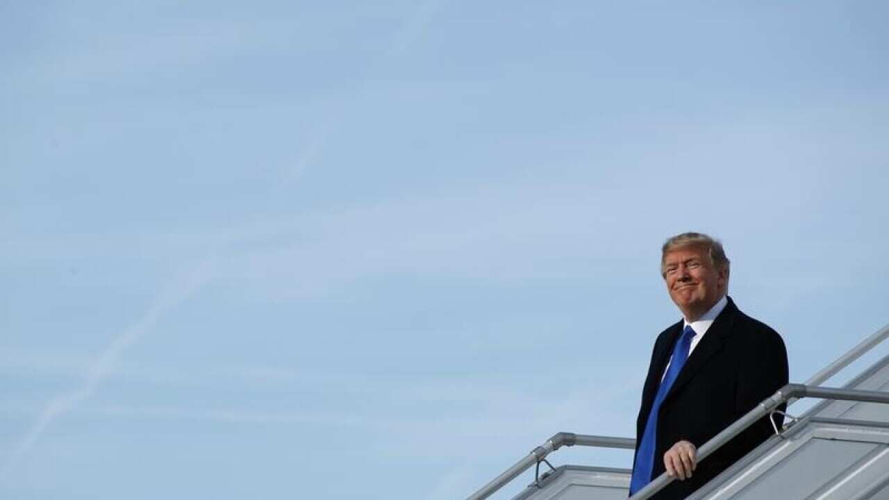 U.S. President Donald Trump alights from Air Force One