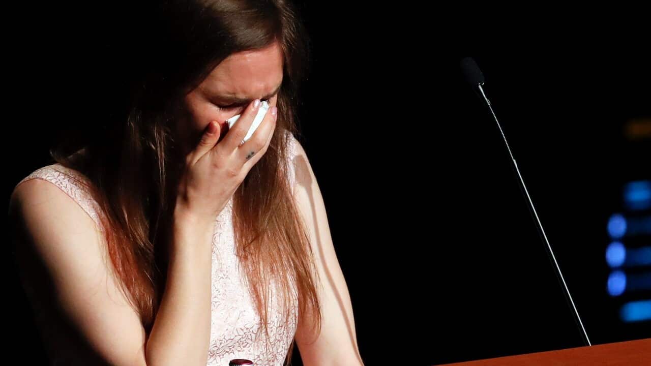 Amanda Knox gets emotional as she speaks at a Criminal Justice Festival at the University of Modena, Italy.