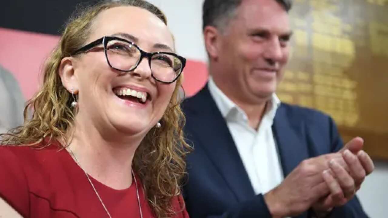 Mary Doyle and deputy prime minister Richard Marles celebrate Labor’s historic byelection win in Aston . Photograph: Julian Smith/AAP