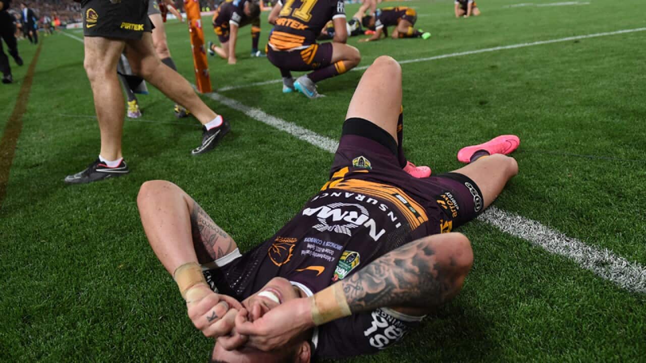 Darius Boyd of the Broncos reacts after the Cowboys scored a try