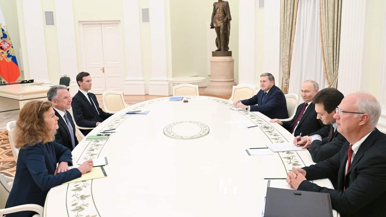 US envoys Steve Witkoff and Jared Kushner sitting at a table opposite Russian officials, including President Vladimir Putin