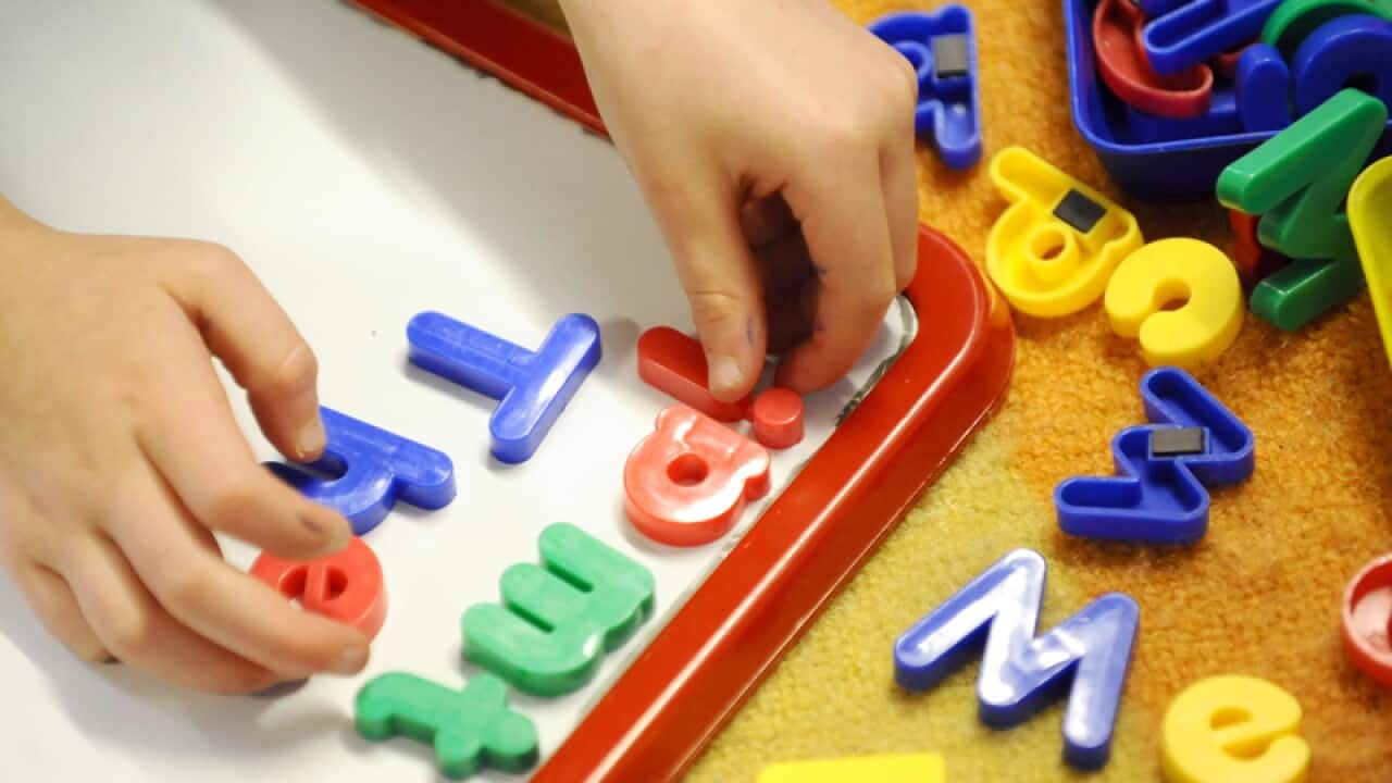 A child plays with toys.