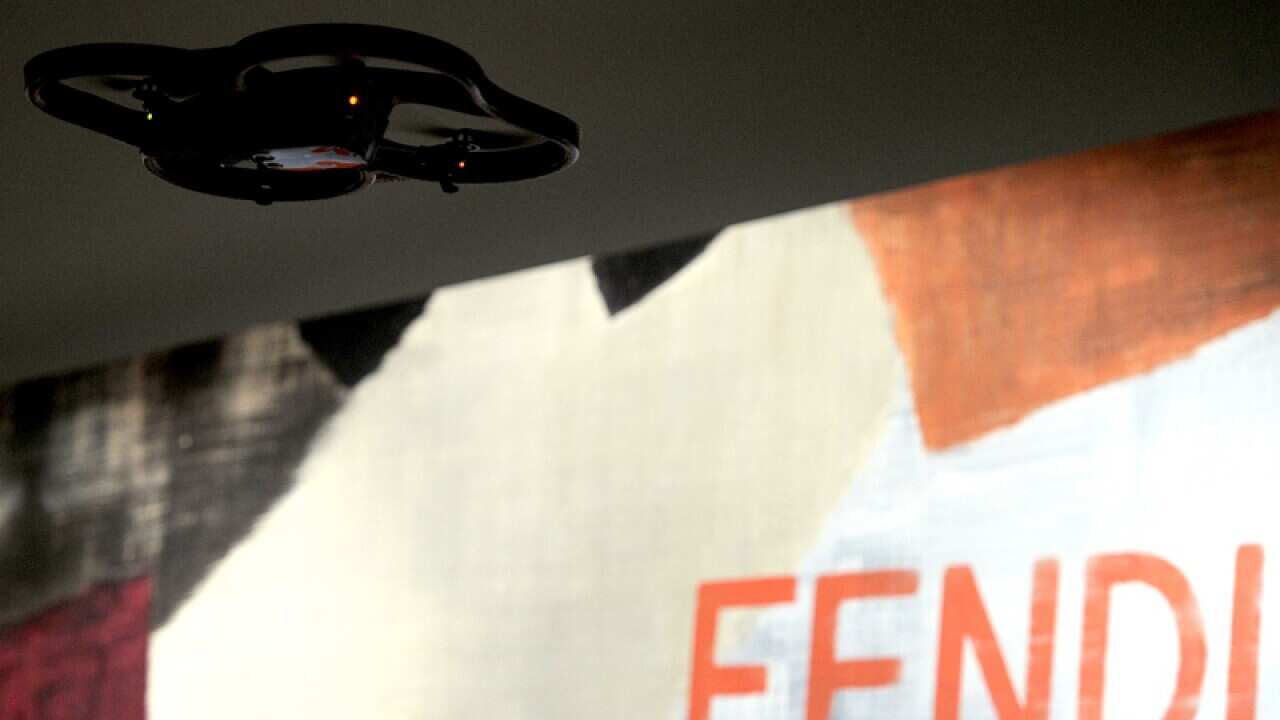 A drone camera flies overhead during Fendi Fall-Winter collection