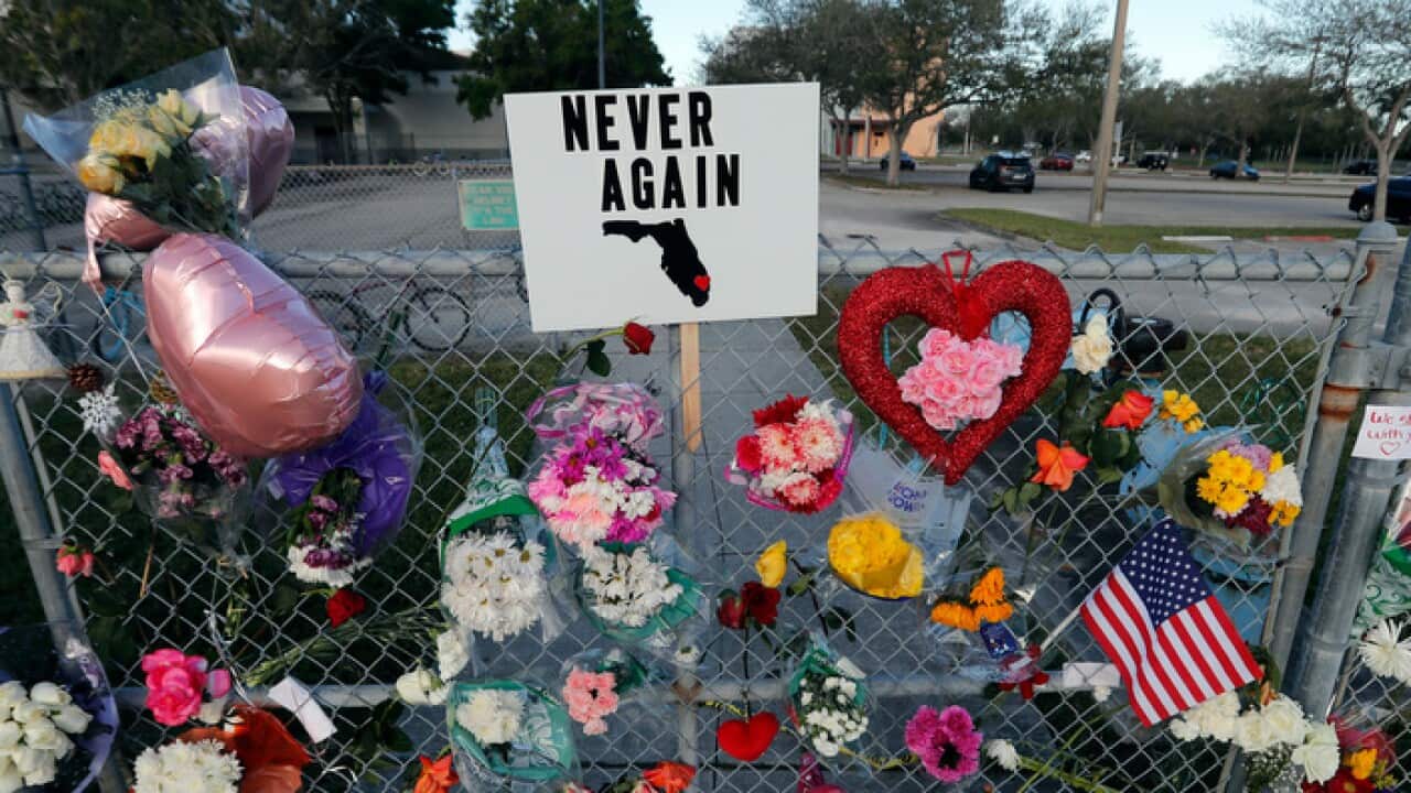 A makeshift memorial is seen outside the Marjory Stoneman Douglas High School