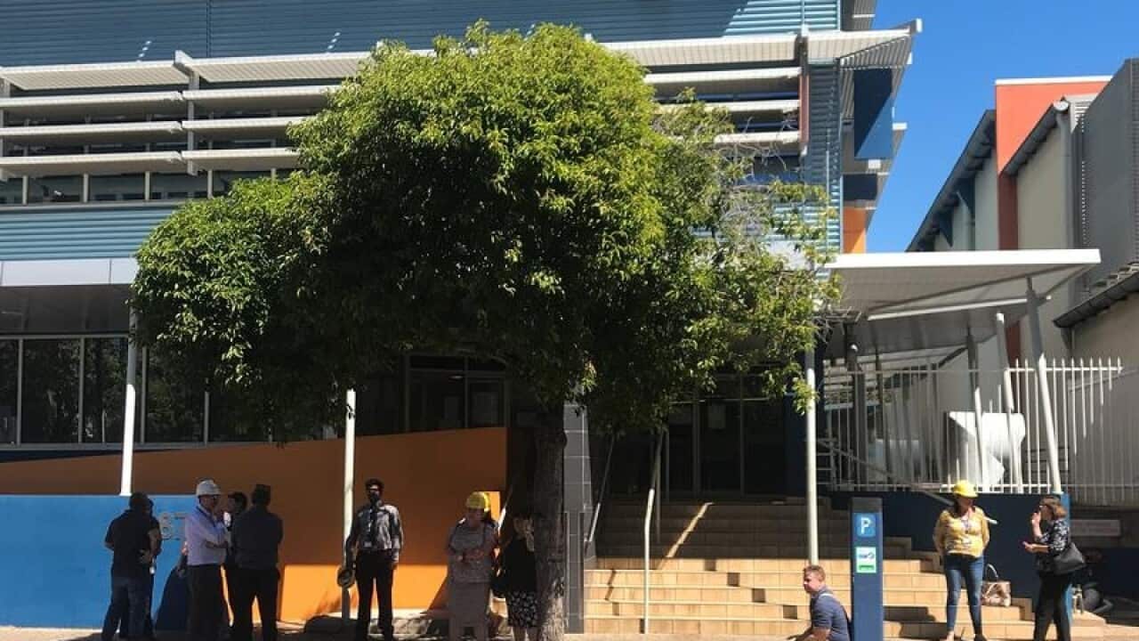 Department of Health CBD workers outside their building.