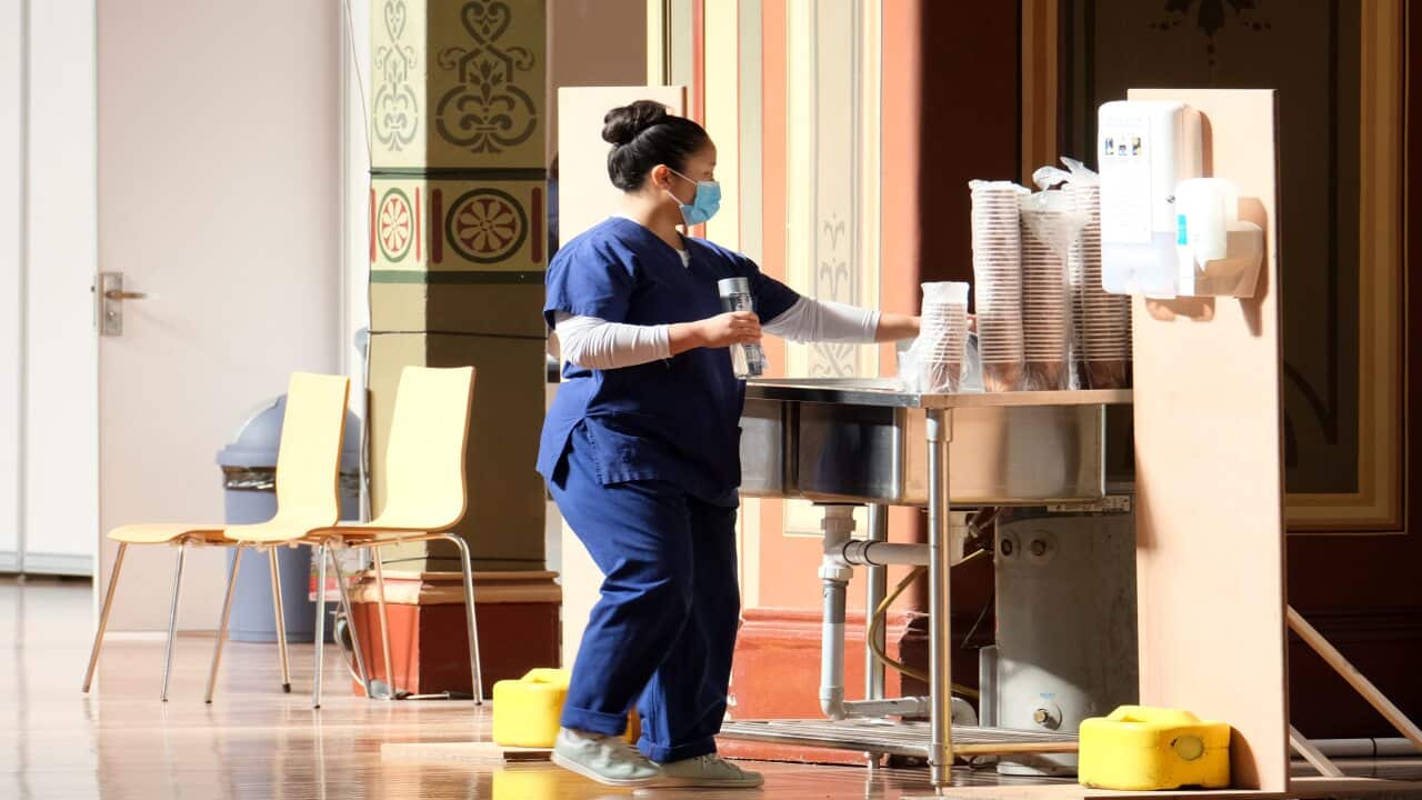 Nursing staff are seen at the mass vaccination hub at the Royal Exhibition Building in Melbourne, Wednesday, 21 April, 2021.