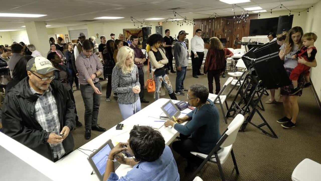 A file image of voters casting their ballots in Nashville