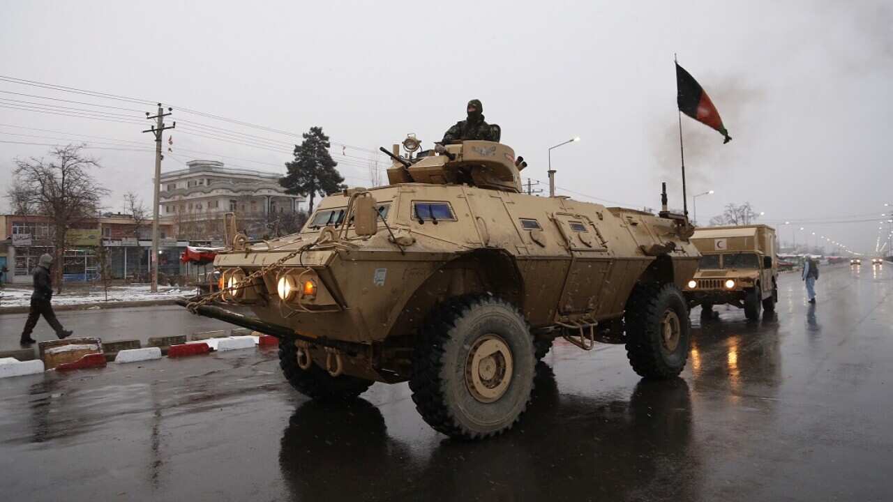 Afghan security personnel arrive at the site of an attack at the Marshal Fahim academy in Kabul, Afghanistan on 29 January, 2018.